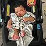 Khamari joined the competition — help win amazing prizes! baby, sleeping, blanket, car_seat, toy, lion, foot, hand, indoors, infant, child, cute, peaceful, black, gray, fabric, comfort, rest, toddler, portrait