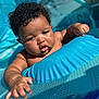 Khamari joined the competition — help win amazing prizes! baby, blue, child, chubby, curly_hair, cute, face, float, hand, infant, inflatable, outdoor, playful, pool, skin, summer, sunlight, swimming, toddler, water