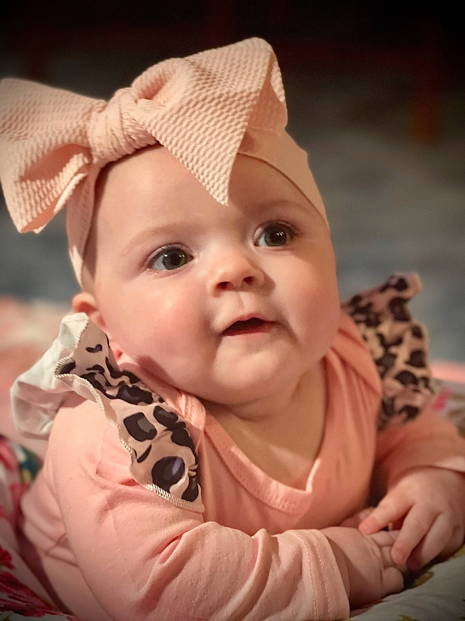 Emberlee joined the competition — help win amazing prizes! baby, baby_toddler_clothing, cap, cheek, chin, close_up, face, flash_photography, fun, gesture, happy, iris, lip, mouth, nose, person, pink, skin, sleeve, smile