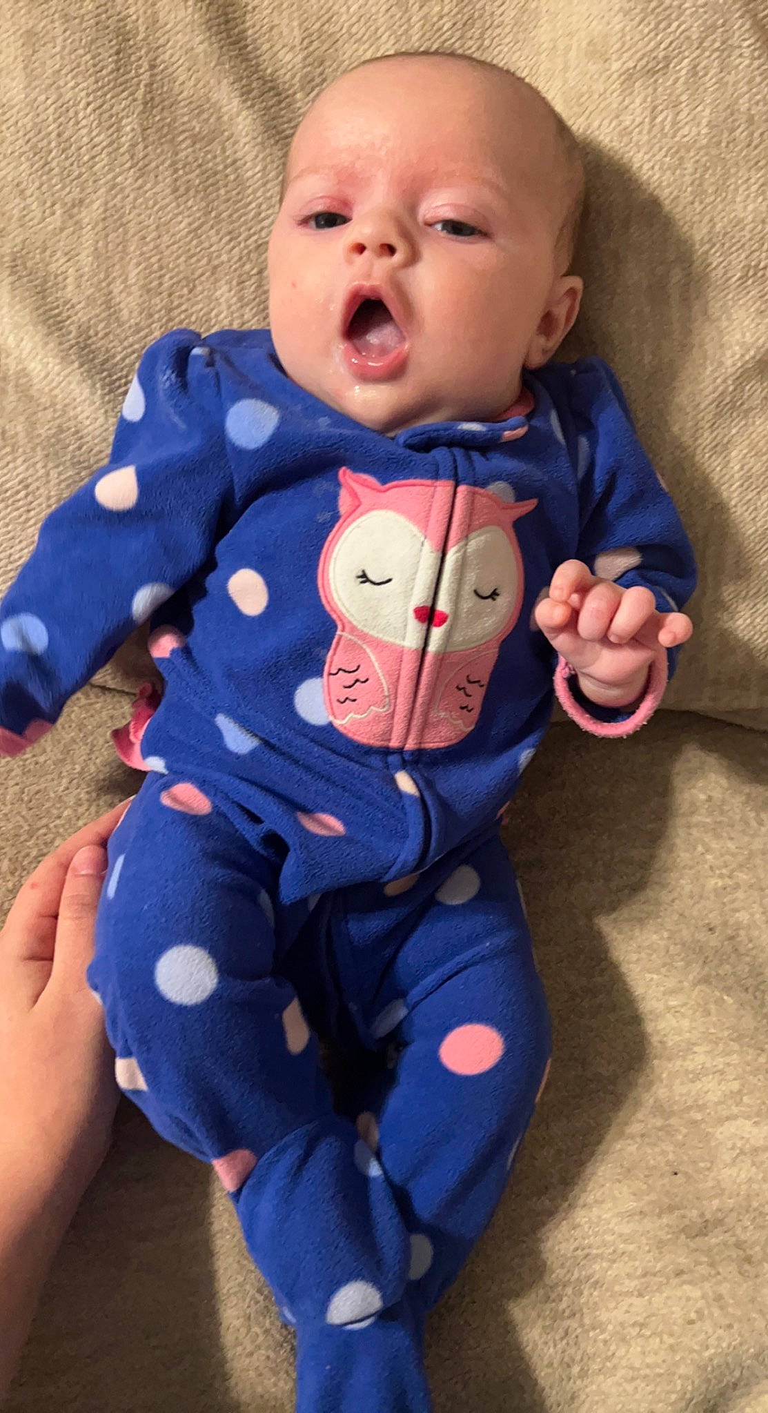 Emberlee is registered to the contest to win money with this photo: arm, baby, baby_products, baby_toddler_clothing, cheek, child, comfort, electric_blue, finger, hairstyle, human_body, jacket, linens, nose, outerwear, pattern, person, skin, sleeve, textile