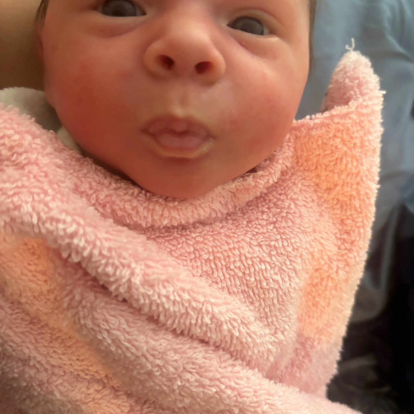 Crystina joined the competition — help win amazing prizes! baby, child, closeup, cozy, cute, expression, face, indoors, infant, newborn, person, pink, portrait, skin, sleepy, soft, texture, towel, warmth, wrapped