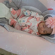 Diana is registered to the contest to win money with this photo: baby, bed, blanket, bonnet, clothing, couch, cradle, crib, cushion, face, furniture, hat, head, homedecor, infantbed, newborn, person, photography, portrait, sleeping