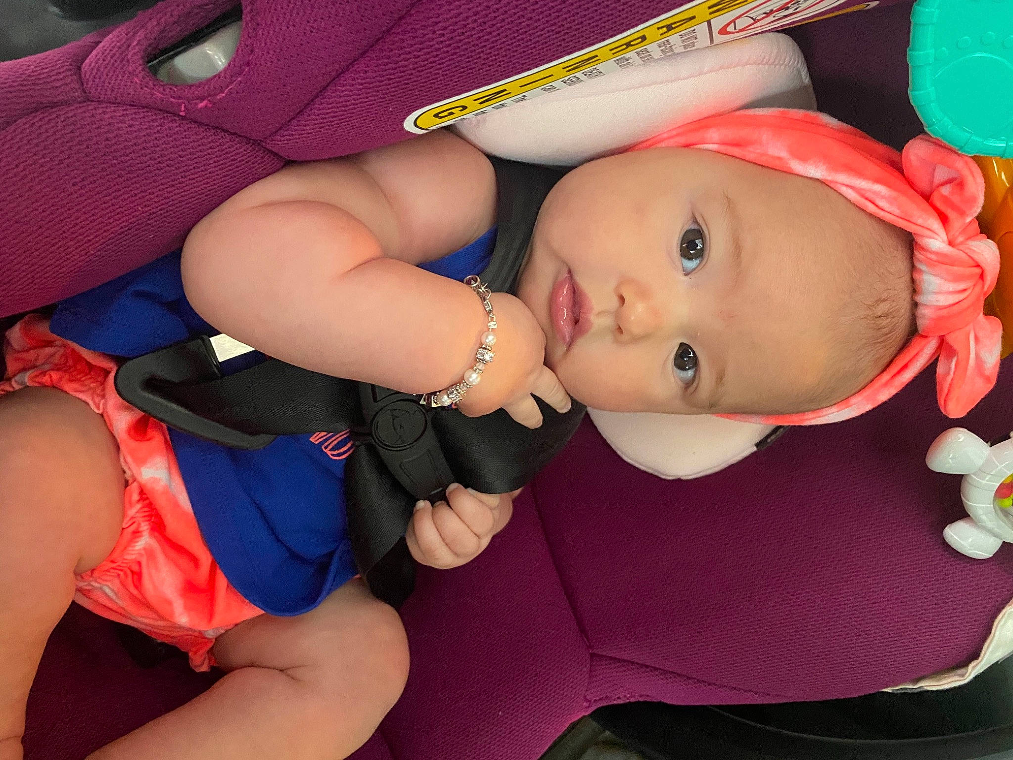 Giana is registered to the contest to win money with this photo: baby, baby_carriage, baby_products, baby_toddler_clothing, car_seat, cheek, child, comfort, finger, fun, hat, headgear, mouth, nail, person, pink, skin, stuffed_toy, thigh, toddler