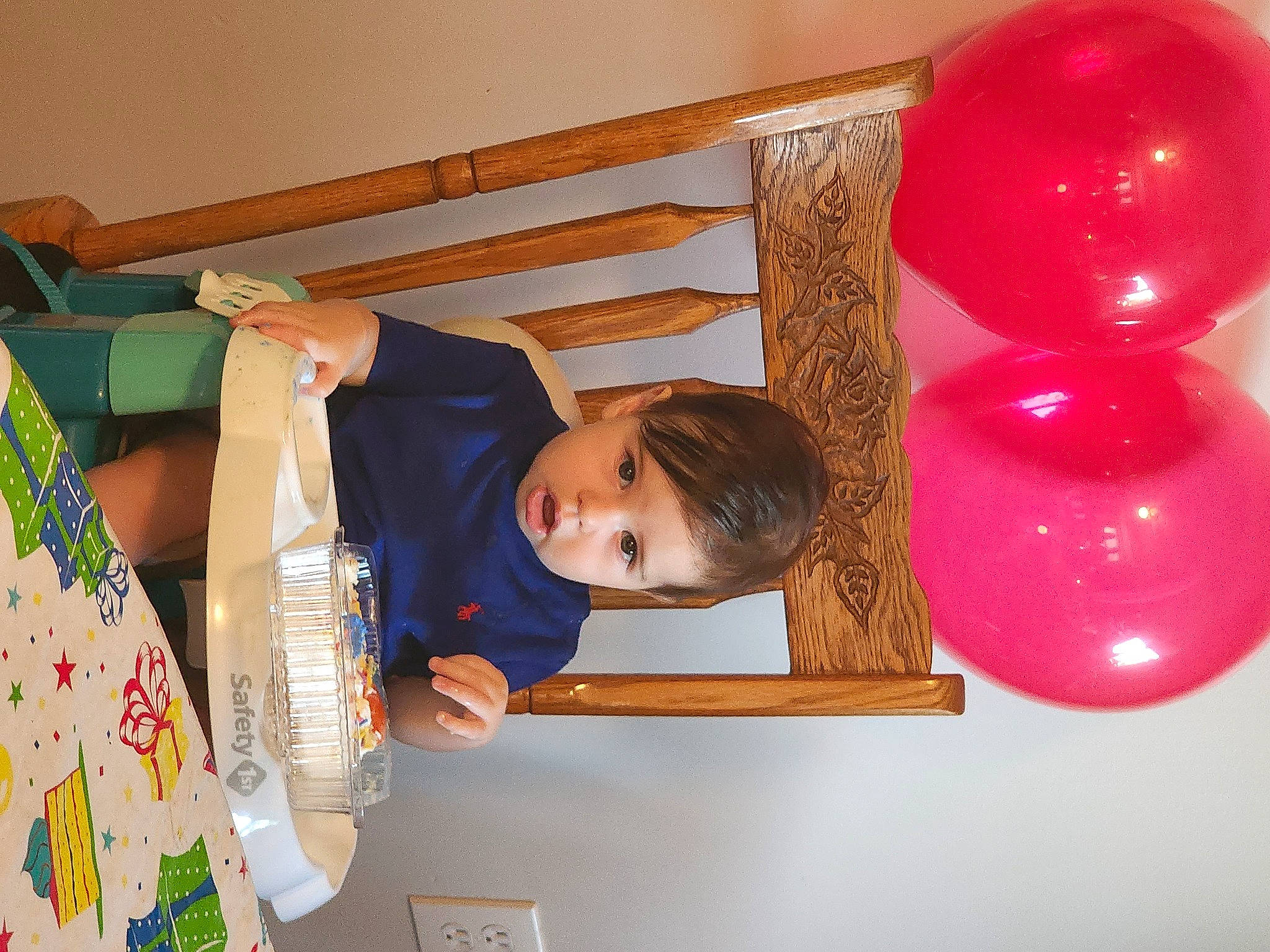 Albert is registered to the contest to win money with this photo: baby, baby_toddler_clothing, balloon, child, event, fun, happy, magenta, party, party_supply, pattern, person, play, product, room, surprise, toddler, window