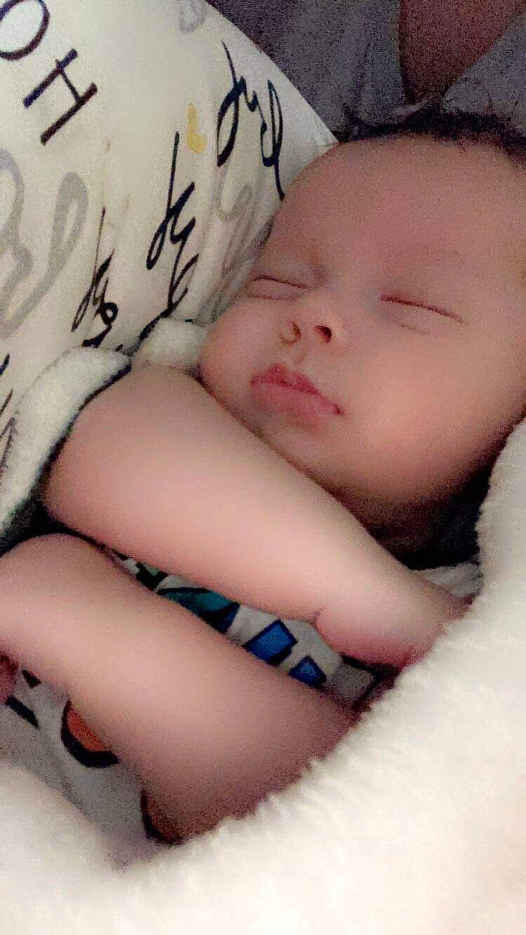 Rylen is registered to the contest to win money with this photo: arm, baby, baby_sleeping, baby_toddler_clothing, child, comfort, eye, eyelash, finger, hand, happy, human_body, linens, lip, mouth, muscle, pattern, person, skin, thigh