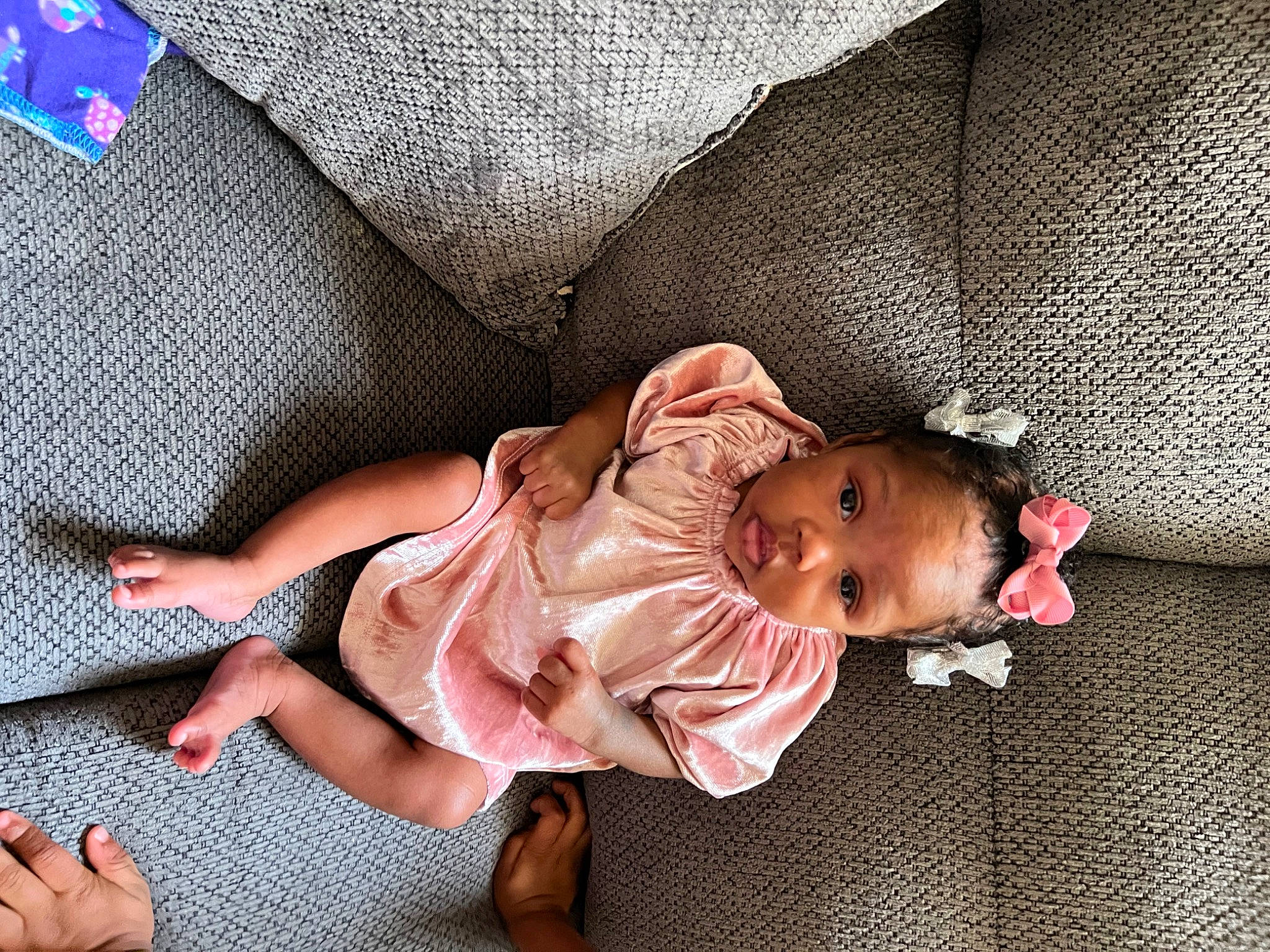 Phallon joined the competition — help win amazing prizes! baby, baby_sleeping, baby_toddler_clothing, barefoot, child, comfort, finger, flooring, foot, human_leg, knee, linens, pattern, person, room, sitting, skin, sleeve, thigh, toddler