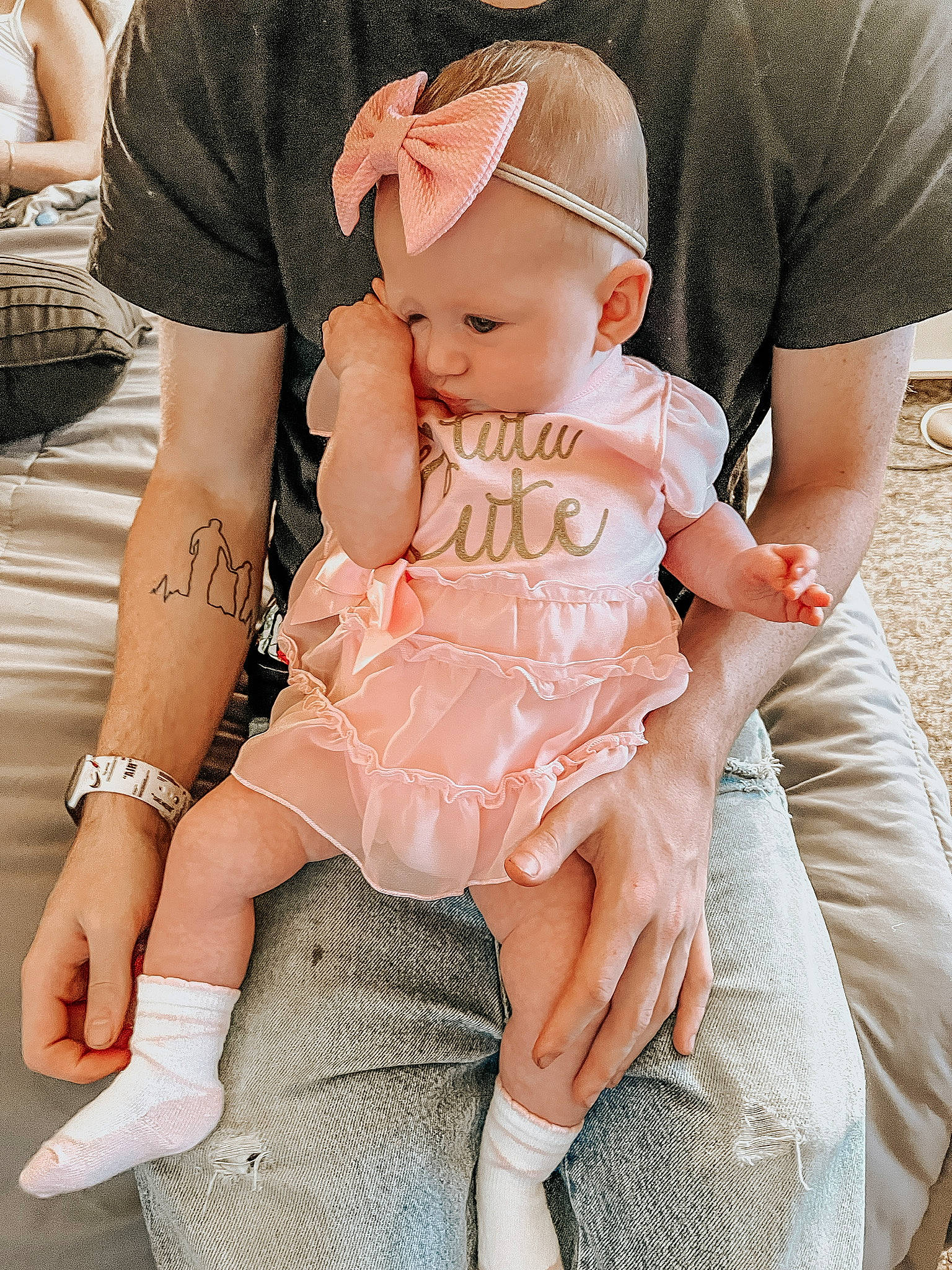 Rini joined the competition — help win amazing prizes! baby, baby_toddler_clothing, cap, child, finger, gesture, hand, happy, hat, human_leg, lap, leg, pattern, person, pink, sitting, skin, sleeve, sock, thigh