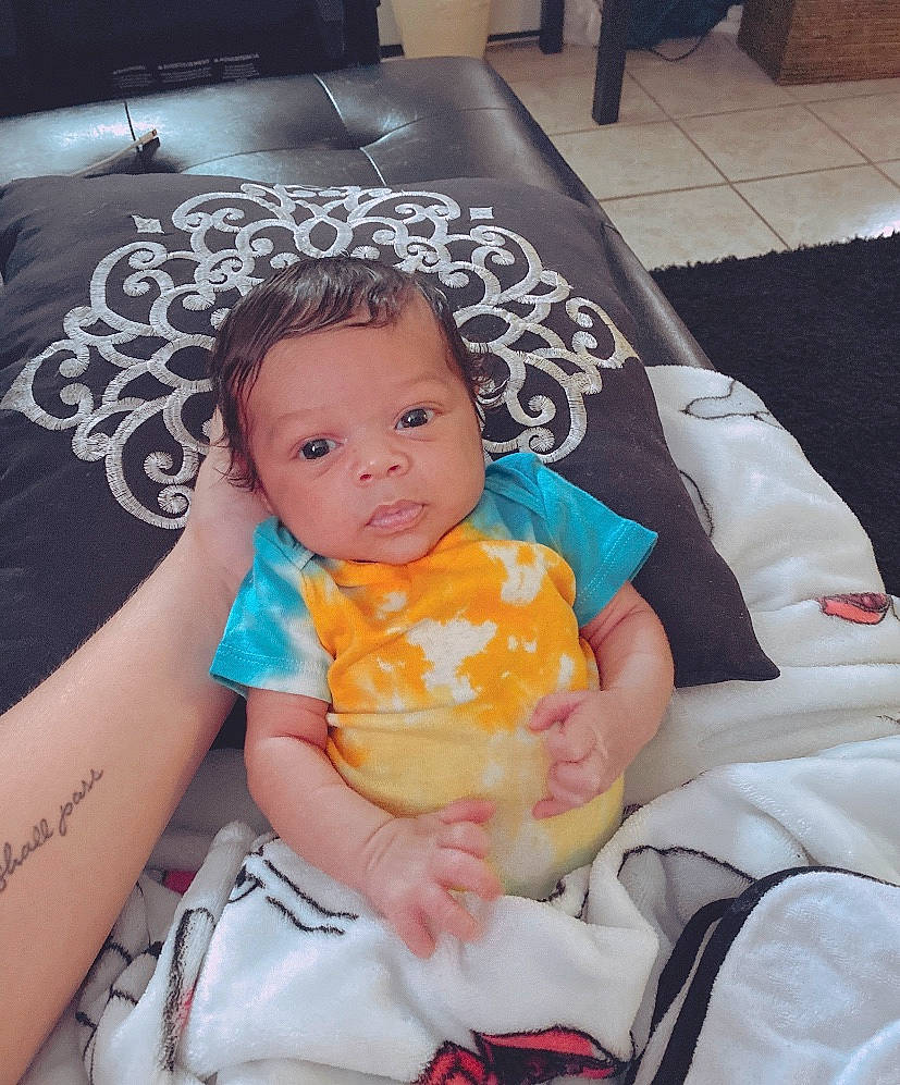 Mario is registered to the contest to win money with this photo: baby, baby_toddler_clothing, cheek, child, person, product, skin, toddler