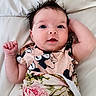 Harlie is registered to the contest to win money with this photo: baby, bed, blanket, child, clothing, comfort, cute, expression, eyes, face, floral, hair, indoor, infant, lying_down, mickey_mouse, newborn, portrait, skin, soft