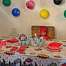 Ryder joined the competition — help win amazing prizes! balloons, birthday_party, blue, cake, celebration, child, costume, cupcakes, decorations, green, happy, indoor, mask, party, red, smile, superhero, table, tablecloth, yellow