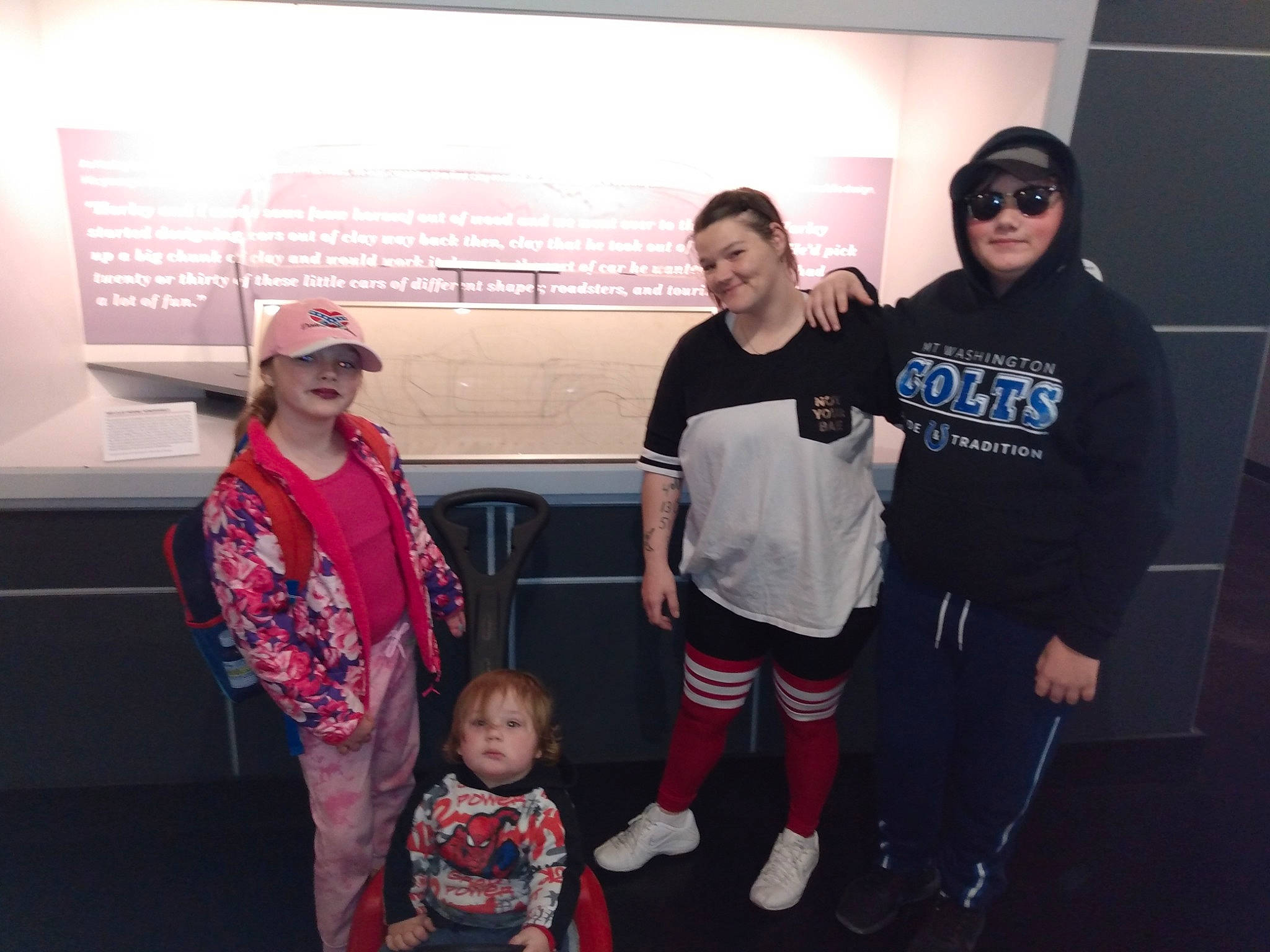 Danny is registered to the contest to win money with this photo: automotive_design, automotive_exterior, baseball_cap, cap, car, event, eyewear, fedora, fun, hat, headgear, headwear, joy, luxury_vehicle, motor_vehicle, person, recreation, shorts, smile, sun_hat