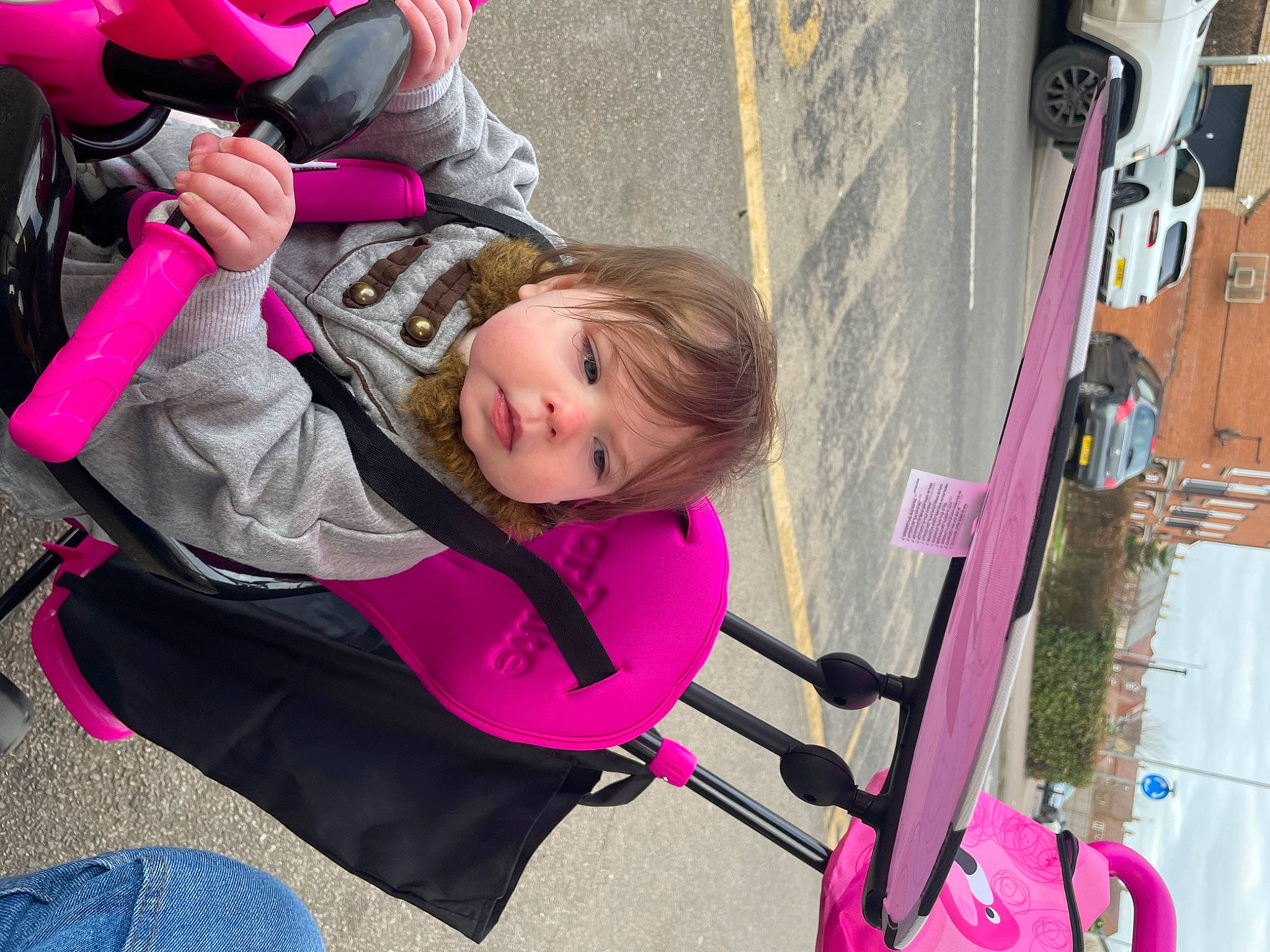 Fallon joined the competition — help win amazing prizes! auto_part, automotive_wheel_system, baby_carriage, baby_products, child, fun, happy, leisure, magenta, person, pink, play, recreation, sitting, smile, tire, toddler, tree, vacation, wheel