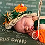 Cyrus joined the competition — help win amazing prizes! newborn, baby, sleeping, crocheted_hat, orange, green, blanket, personalized_blanket, name_text, toy, crocheted_toy, fish_toy, closeup, peaceful, resting, infant, cute, soft_lighting, portrait, indoor