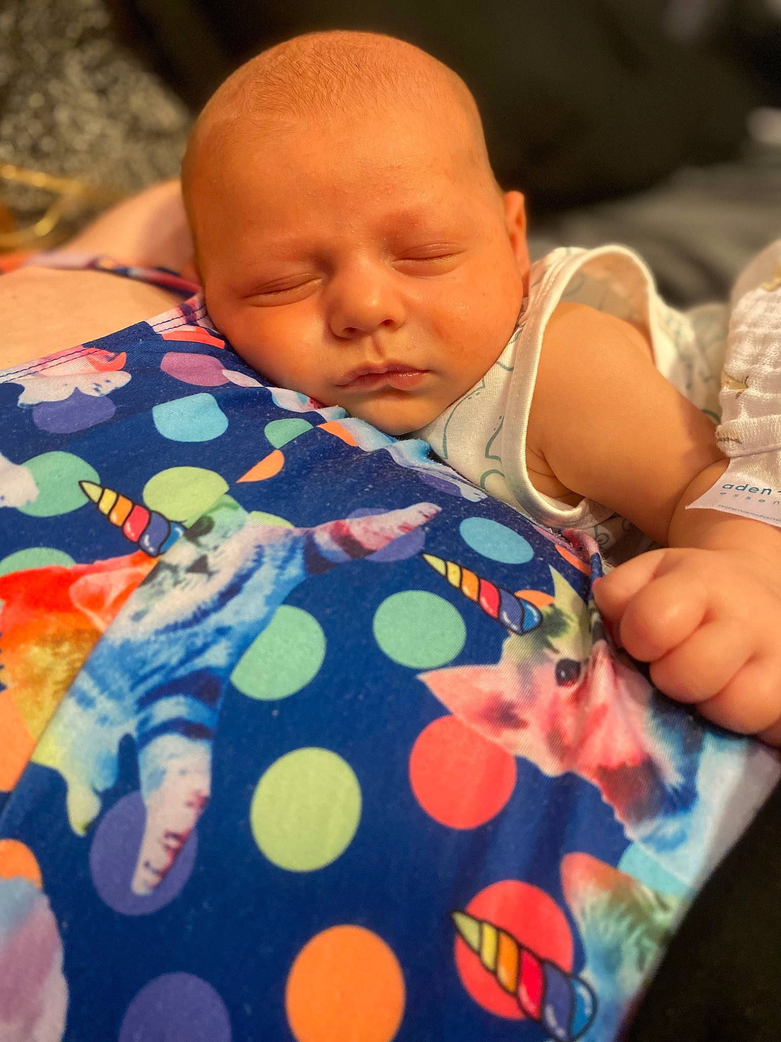 Tatum Ray joined the competition — help win amazing prizes! baby, baby_toddler_clothing, beauty, cheek, child, comfort, facial_expression, finger, human, linens, neck, nose, orange, organ, pattern, person, product, skin, sleeve, textile