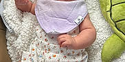 Vivian joined the competition — help win amazing prizes! baby, infant, headband, floral, romper, blanket, plush_toy, turtle, cute, chubby_cheeks, indoors, soft_texture, clothing, sitting, child, face, expression, comfort, young, adorable