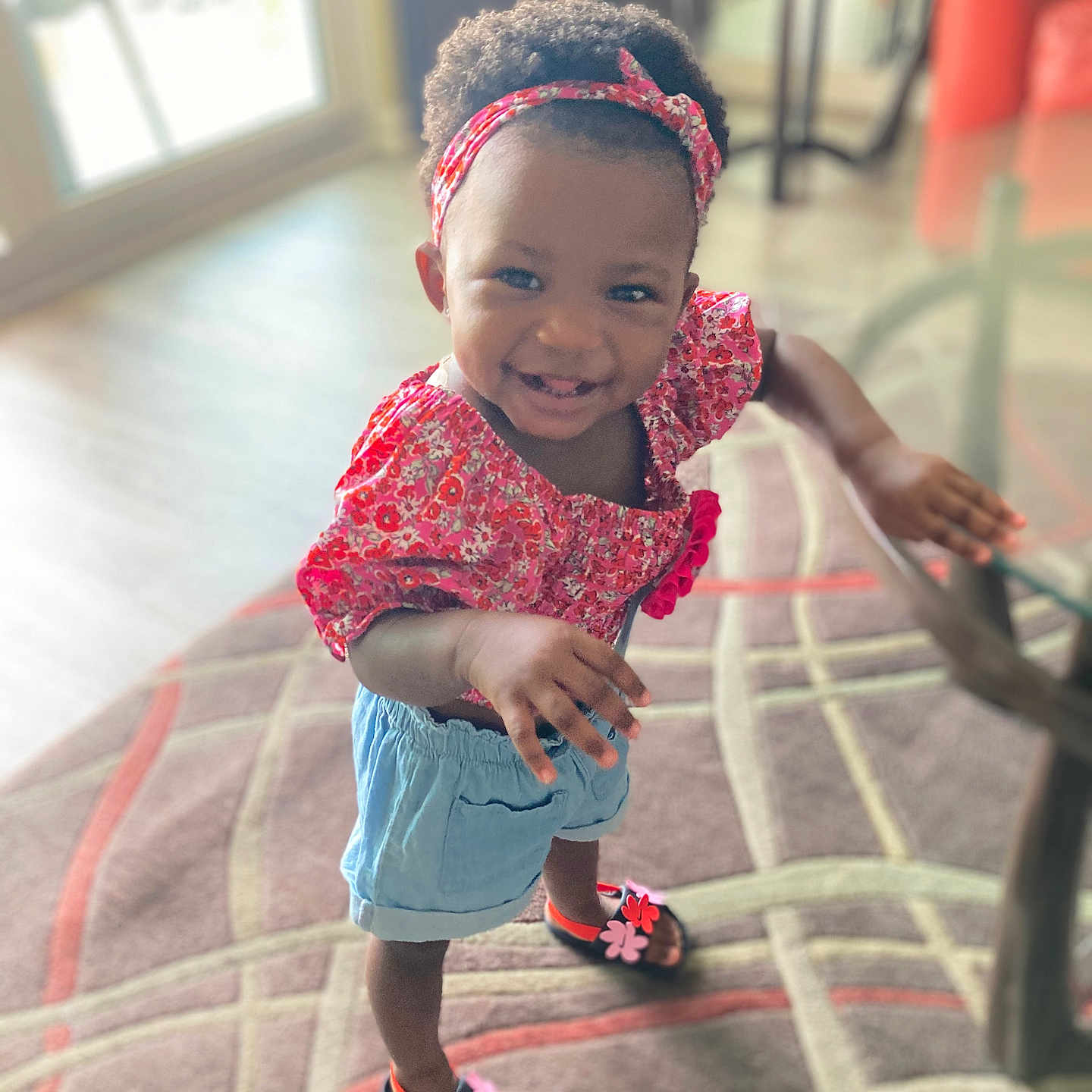 Xyla is registered to the contest to win money with this photo: accessories, child, clothing, dress, face, female, footwear, girl, happy, head, jeans, pants, person, photography, portrait, sandal, shoe, shorts, sitting, smile