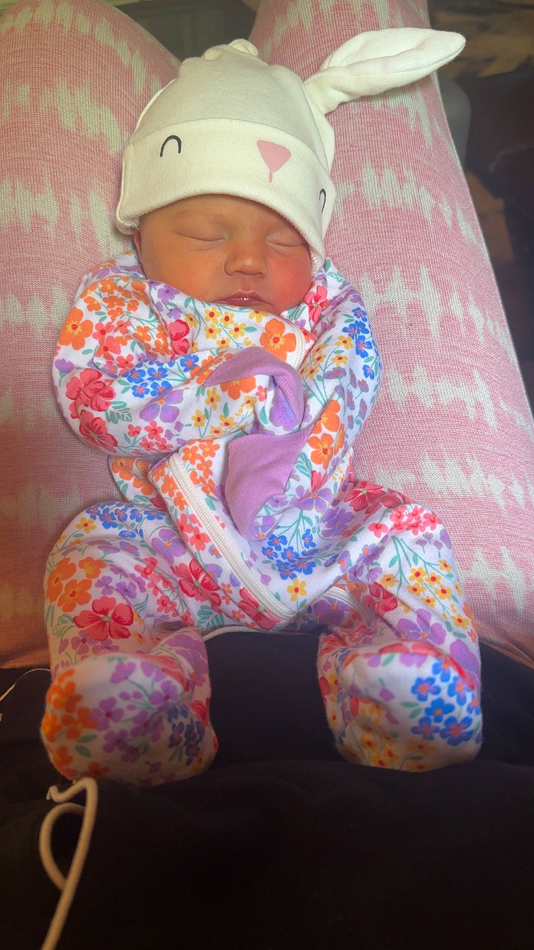 baby, blanket, bonnet, cap, clothing, couch, cushion, face, furniture, glove, hat, head, homedecor, newborn, pants, person, photography, portrait, quilt, sleeping