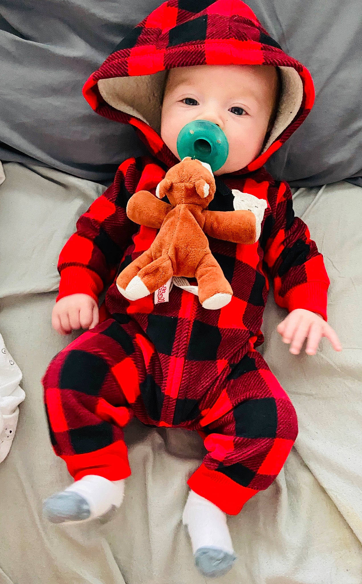 Jaxson joined the competition — help win amazing prizes! baby, child, christmas, costume, design, doll, fictional_character, headwear, holiday, pattern, person, plaid, plush, red, stuffed_toy, tartan, textile, toddler, toy