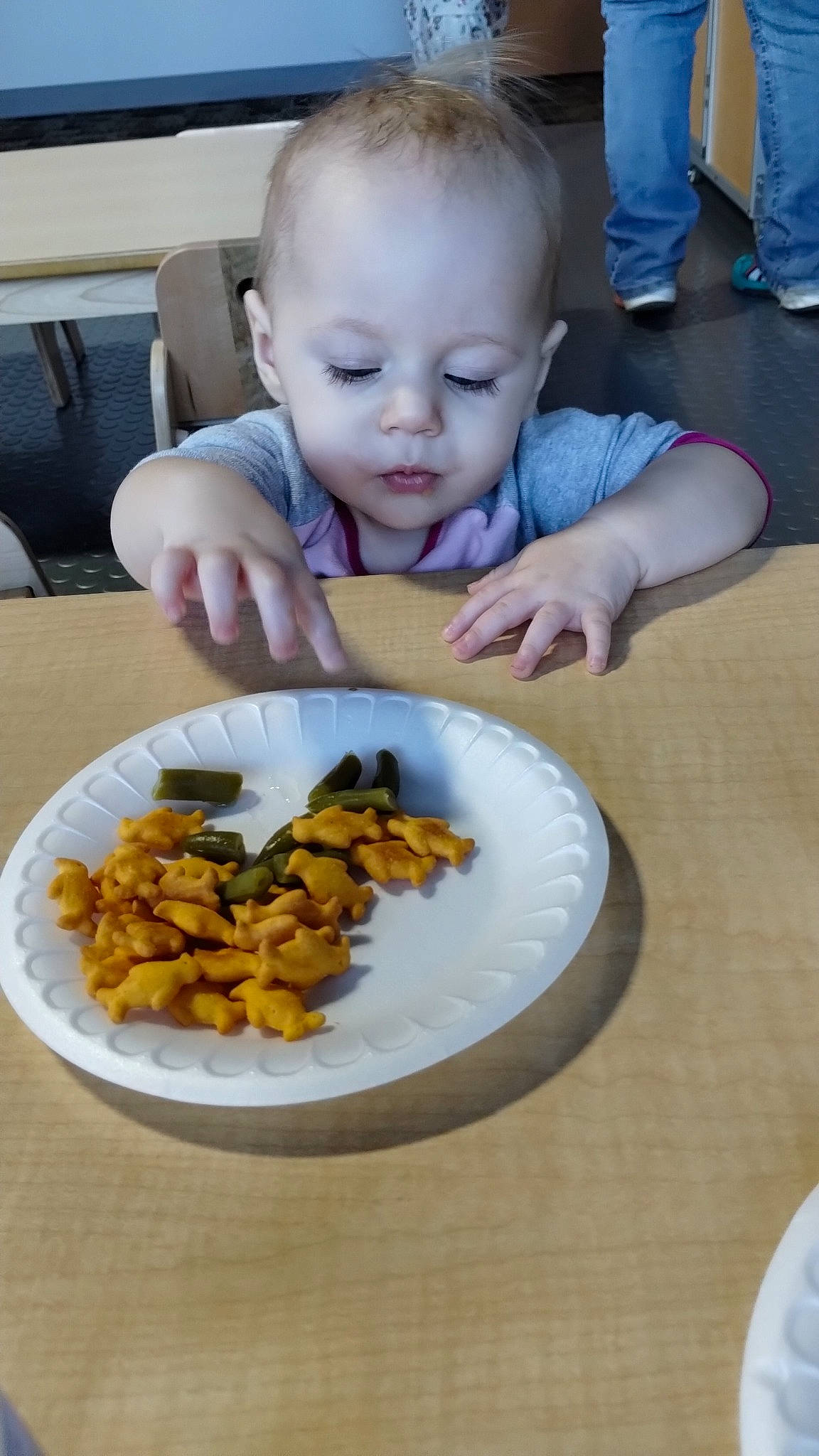 Rose Marie Hale is registered to the contest to win money with this photo: baby, breakfast, chair, child, comfort_food, cuisine, dish, eating, flooring, food, ingredient, person, plant, plate, produce, recipe, t_shirt, table, tableware, toddler