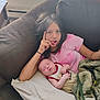 Marshall joined the competition — help win amazing prizes! child, baby, couch, blanket, pillow, relaxing, indoor, person, sleeping, casual, pink_shirt, brown_couch, hair, hand, tongue_out, window_blinds, furniture, family, comfort