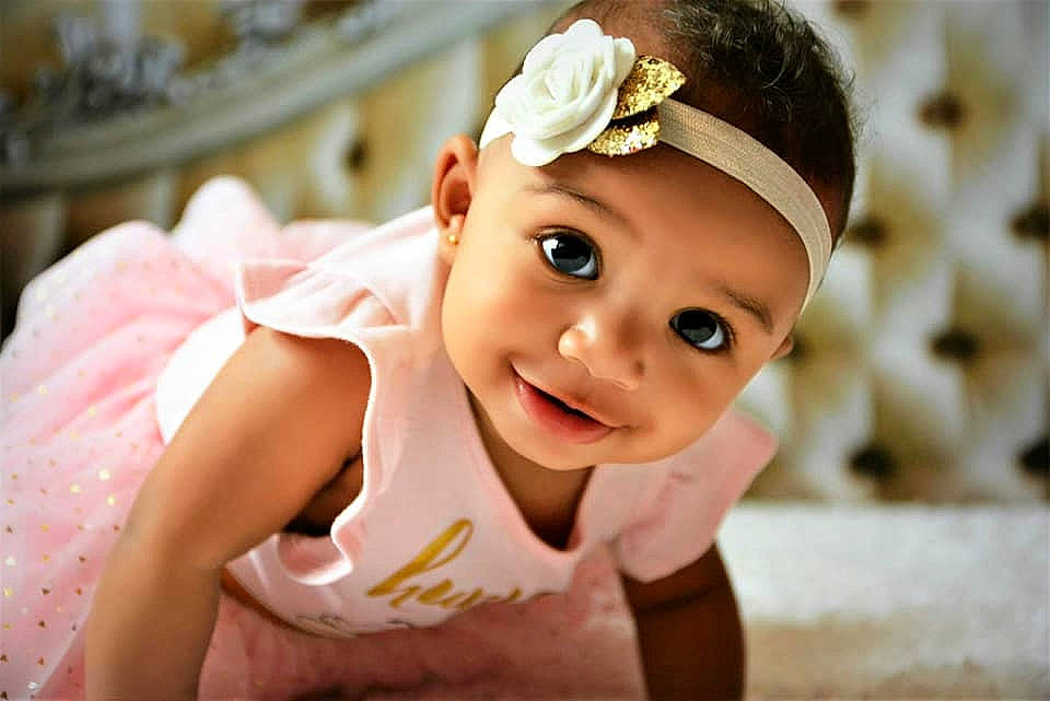 Zmarianna is registered to the contest to win money with this photo: baby, cheek, child, child_model, ear, fashion_accessory, forehead, hair_accessory, happy, headband, headgear, headpiece, headwear, person, pink, skin, smile, toddler