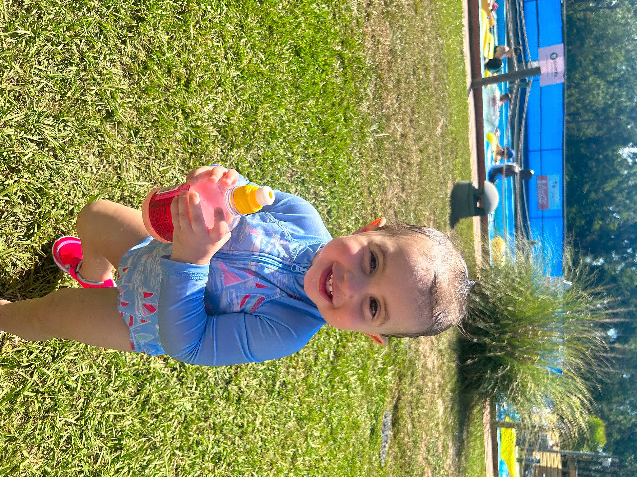 Ren is registered to the contest to win money with this photo: baby, baby_toddler_clothing, child, electric_blue, fun, grass, grass_family, grassland, happy, hat, joy, leaf, leisure, outdoor_play_equipment, people_in_nature, person, plant, playground, recreation, smile