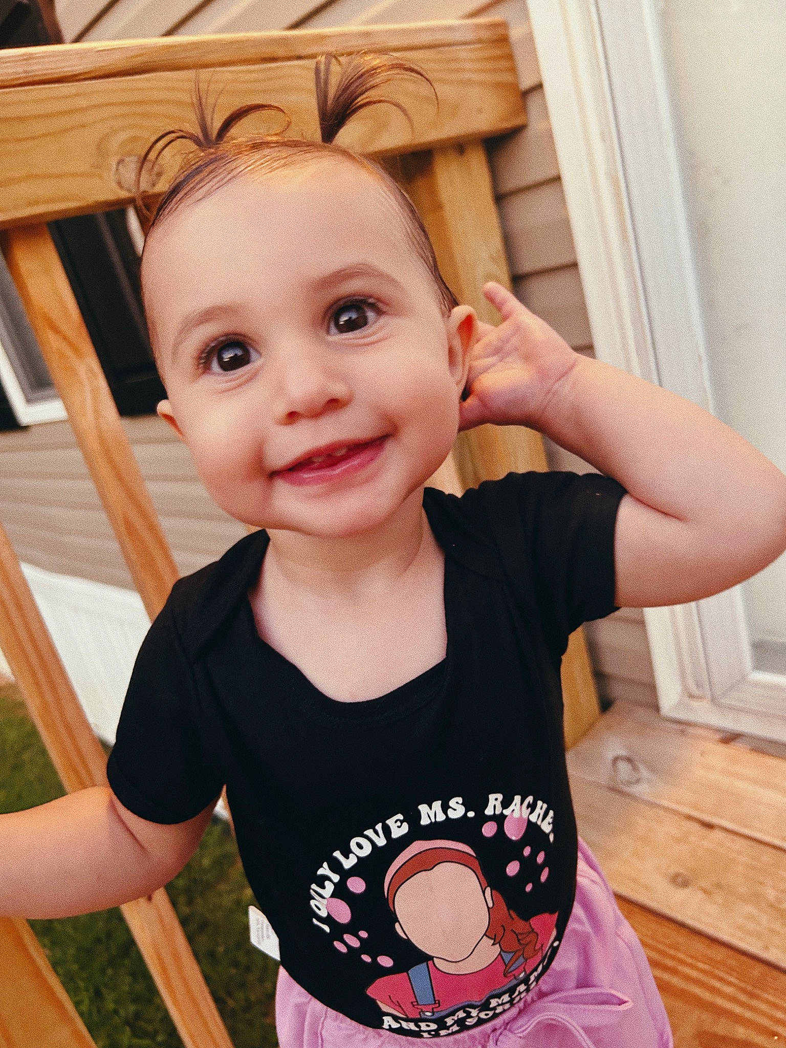 Ren is registered to the contest to win money with this photo: baby, baby_toddler_clothing, cheek, chin, cool, facial_expression, finger, gesture, hairstyle, happy, head, joy, neck, person, pink, product, skin, sleeve, smile, standing