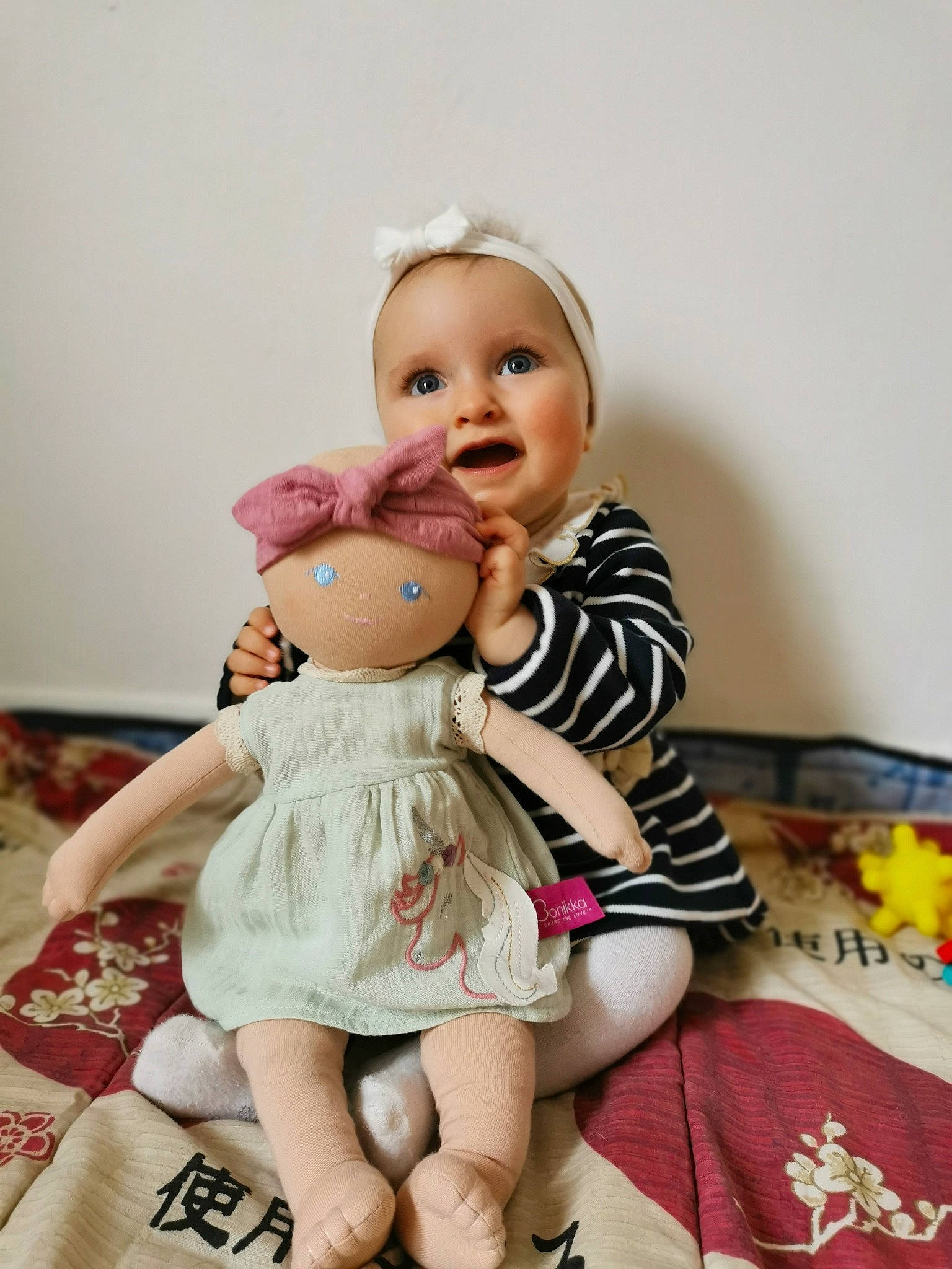 Willow participe au concours pour gagner de l'argent avec cette photo : baby, baby_toddler_clothing, blond, cheek, child, doll, dress, flash_photography, foot, fun, happy, human_leg, iris, leg, person, pink, skin, smile, teddy_bear, thigh