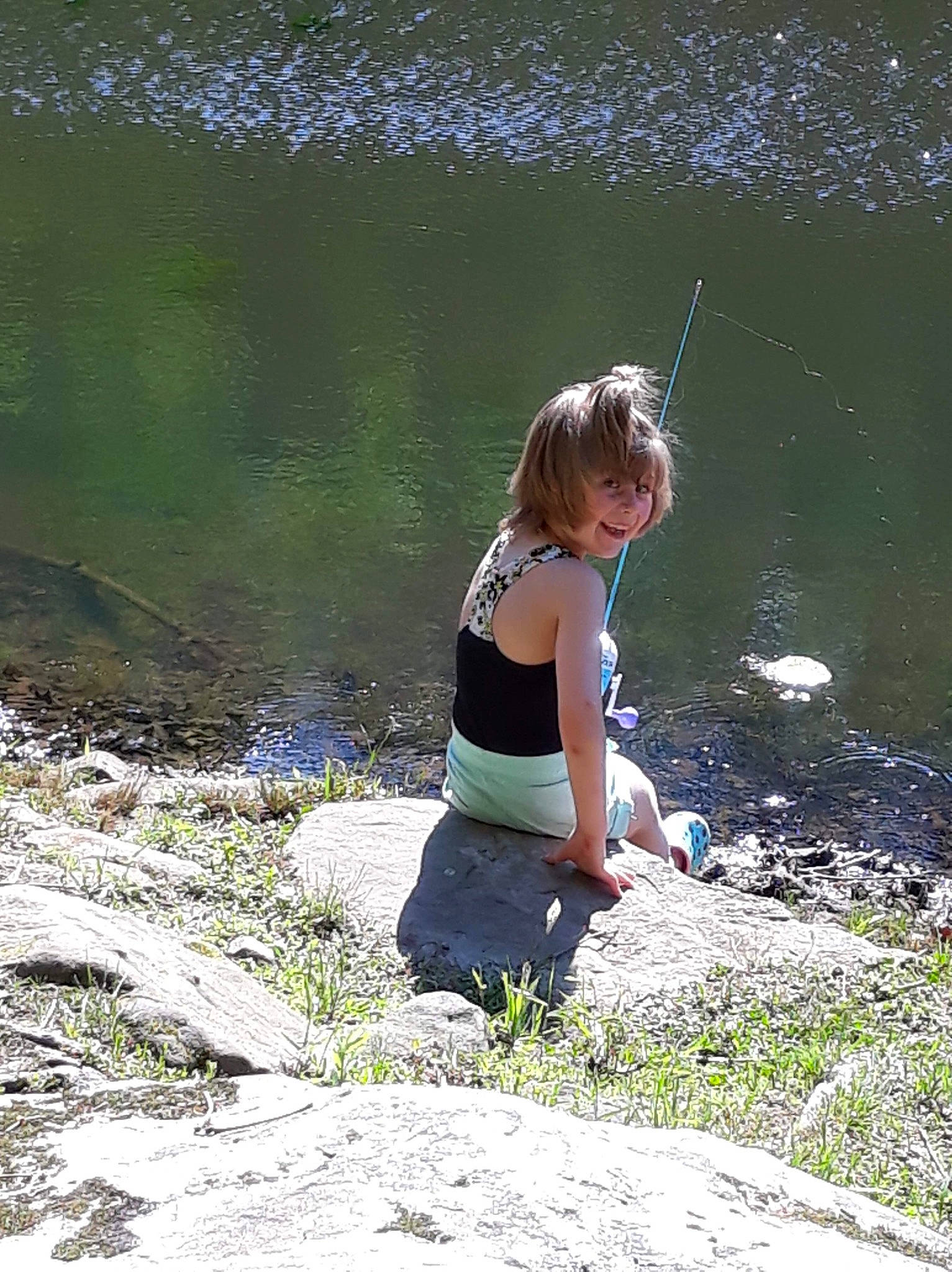 Riley joined the competition — help win amazing prizes! bank, child, grass, people_in_nature, person, recreation, vacation, water