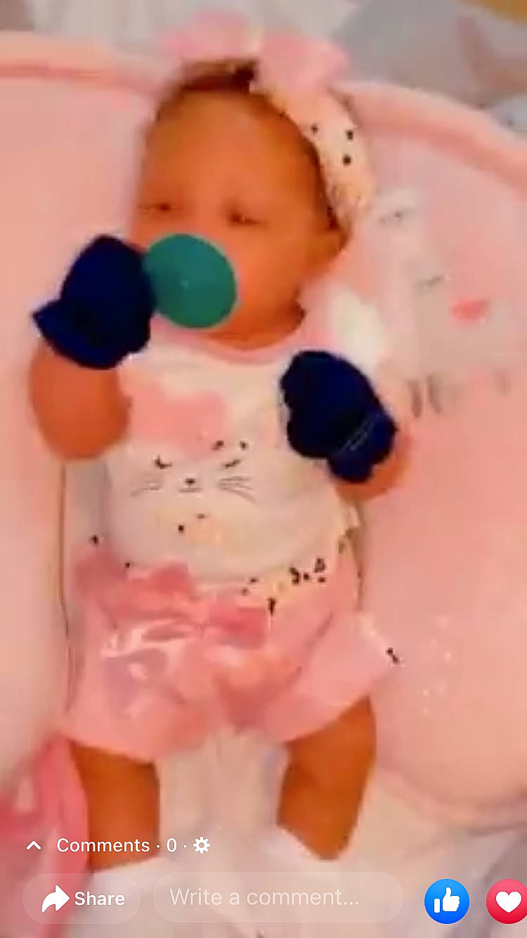 Kamaria is registered to the contest to win money with this photo: baby_products, baby_toddler_clothing, baby_toys, bathing, bathtub, carmine, cheek, child, circle, figurine, happy, person, pink, plastic, sitting, sugar_cake, thumb, toddler, toy