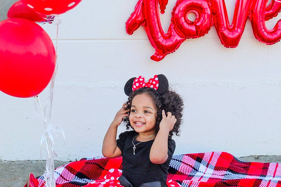 Renee joined the competition — help win amazing prizes! balloon, beauty, clothing, event, facial_expression, flash_photography, fun, happy, joy, leisure, magenta, party_supply, people, person, photograph, pink, red, smile, snapshot, tartan