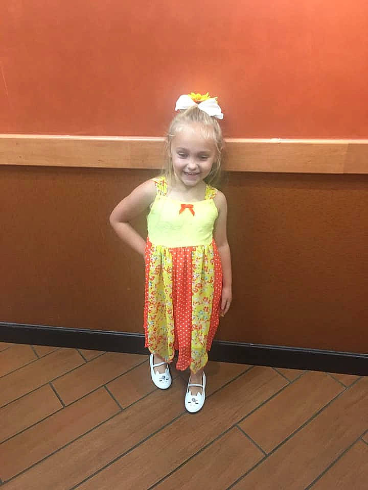 Laylah joined the competition — help win amazing prizes! baby_toddler_clothing, child, costume, fashion_design, floor, flooring, fun, happy, hardwood, joy, leg, pattern, peach, person, room, sandal, sleeve, smile, standing, toddler