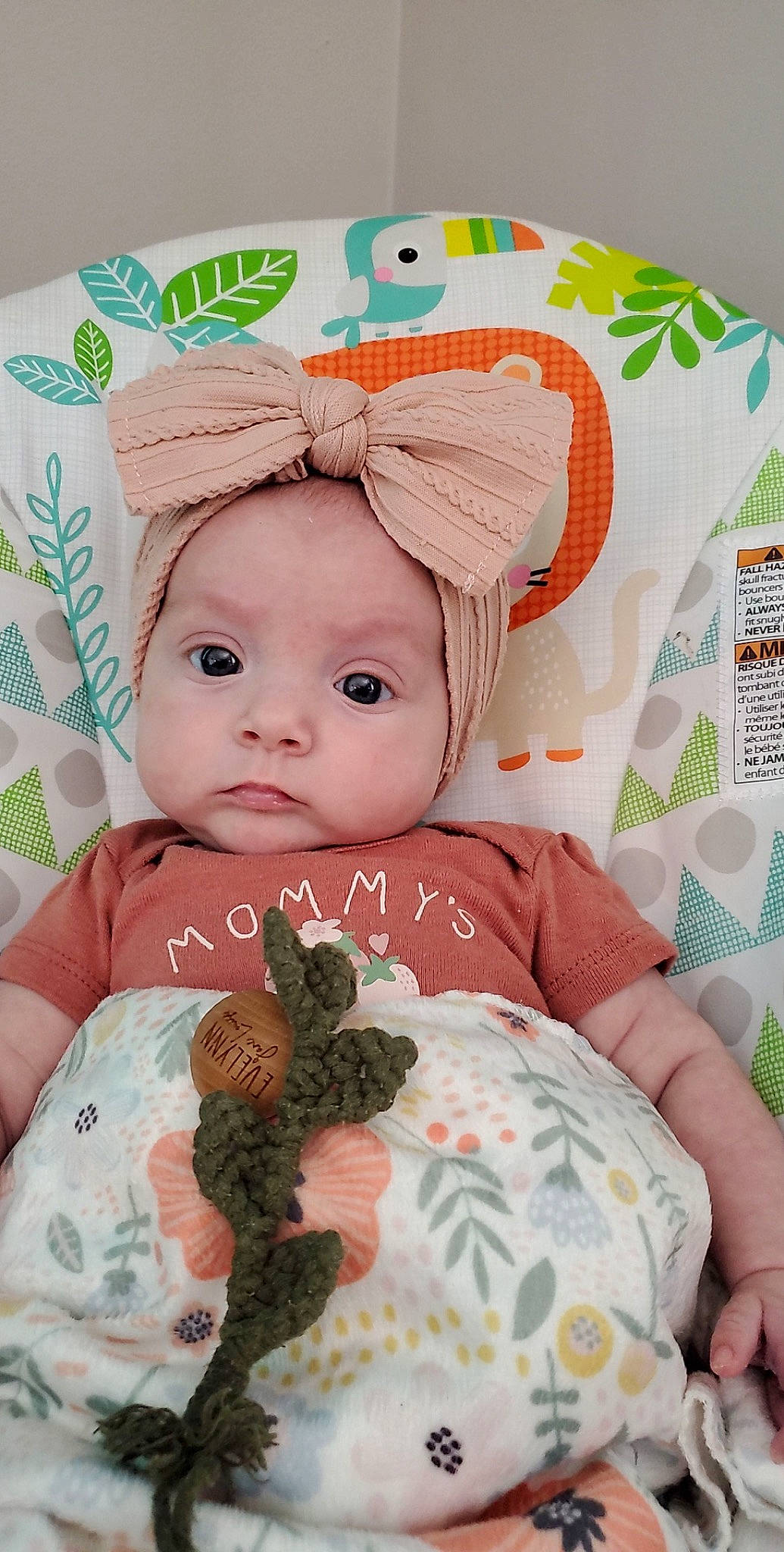 Evelynn joined the competition — help win amazing prizes! baby, baby_toddler_clothing, cap, cheek, child, eye, eyelash, fashion_accessory, hair_accessory, headgear, headpiece, headwear, linens, mammal, pattern, person, pink, skin, sleeve, textile