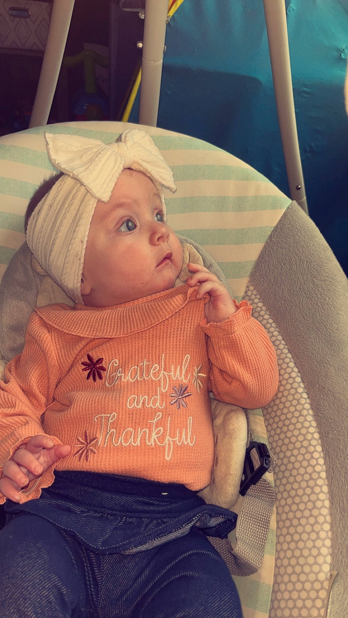 Evelynn is registered to the contest to win money with this photo: baby, baby_products, baby_toddler_clothing, blond, cap, chair, cheek, child, chin, comfort, face, fun, happy, head, headgear, headwear, lap, mouth, person, skin