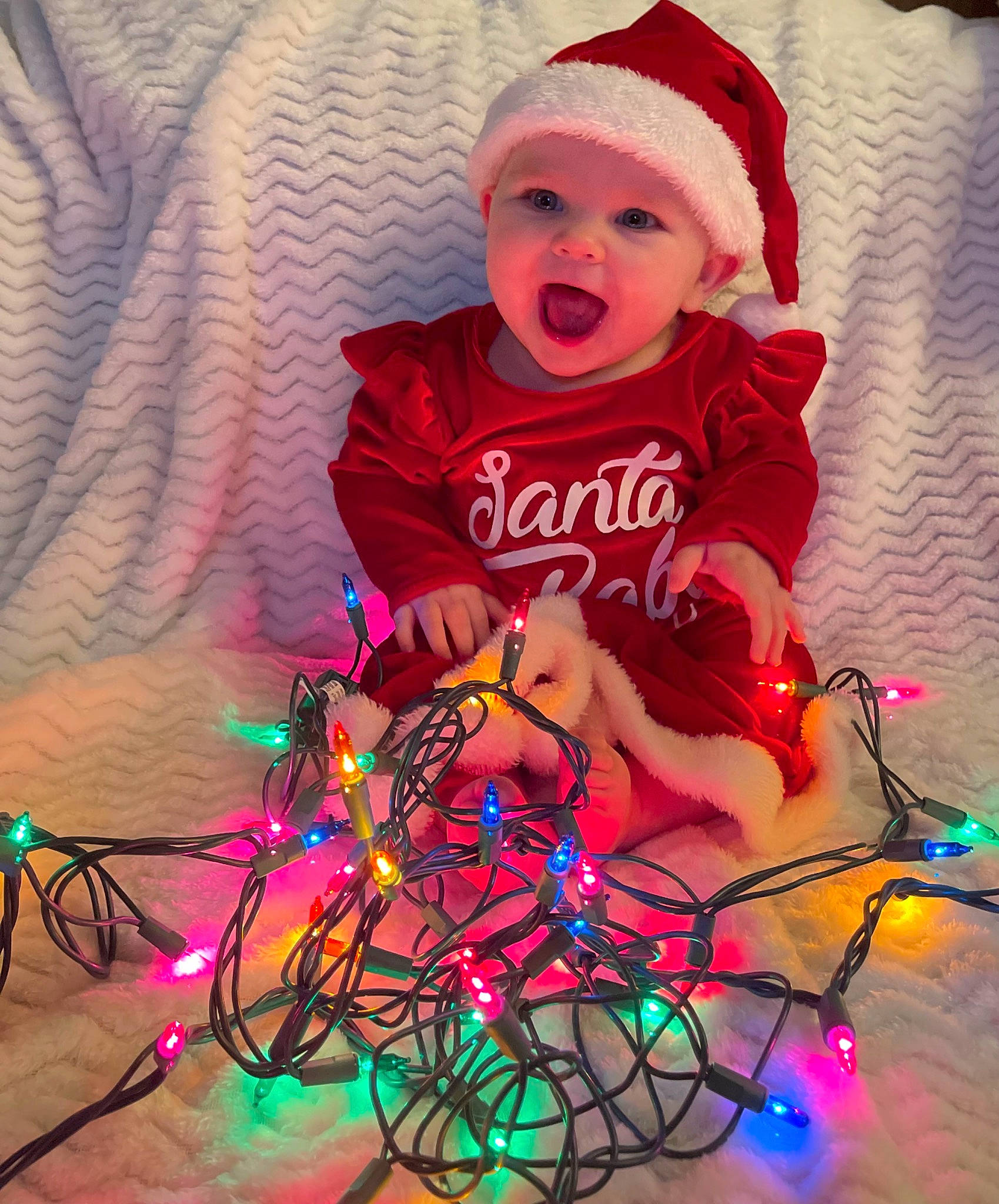 Kinslei joined the competition — help win amazing prizes! baby, baby_toddler_clothing, beauty, cap, child, christmas, christmas_decoration, christmas_ornament, cool, fun, happy, hat, head, headwear, holiday, light, magenta, person, pink, purple