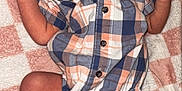 Emmanuel joined the competition — help win amazing prizes! newborn, baby, sleeping, plaid, onesie, blanket, infant, skin, clothing, peaceful, cute, resting, child, human, foot, hand, soft, pattern, indoors, lying_down