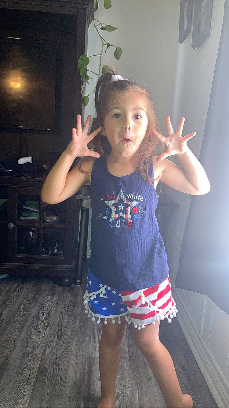 Annabell joined the competition — help win amazing prizes! dress, electric_blue, finger, flash_photography, fun, gesture, happy, human_leg, joint, leg, long_hair, person, shoulder, skin, sleeve, standing, t_shirt, thigh, toddler, trunk