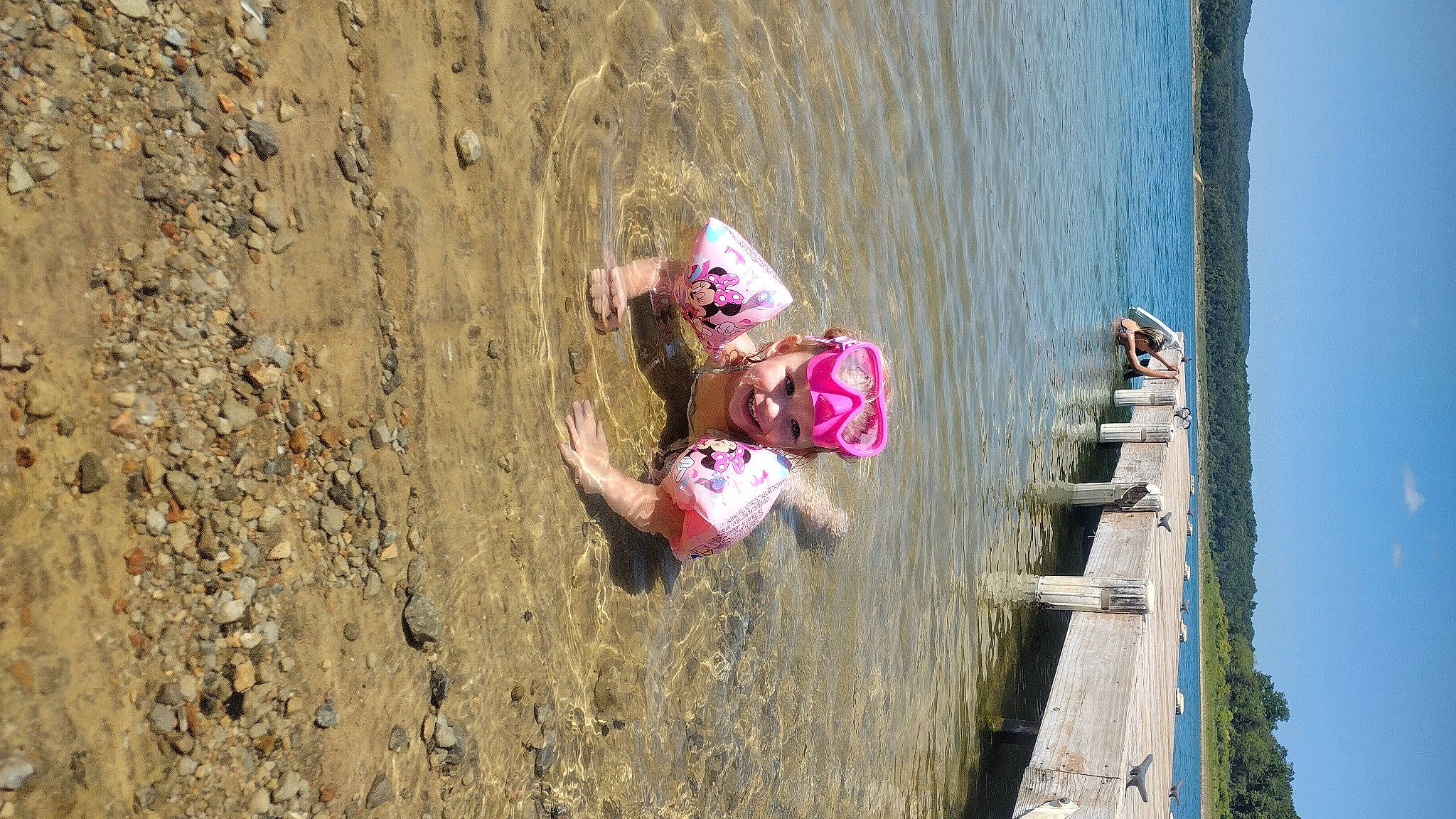 Hazelbelle is registered to the contest to win money with this photo: beach, fun, happy, hat, headwear, joy, lake, leisure, person, plant, recreation, sky, soil, toddler, travel, tree, vacation, water, wood