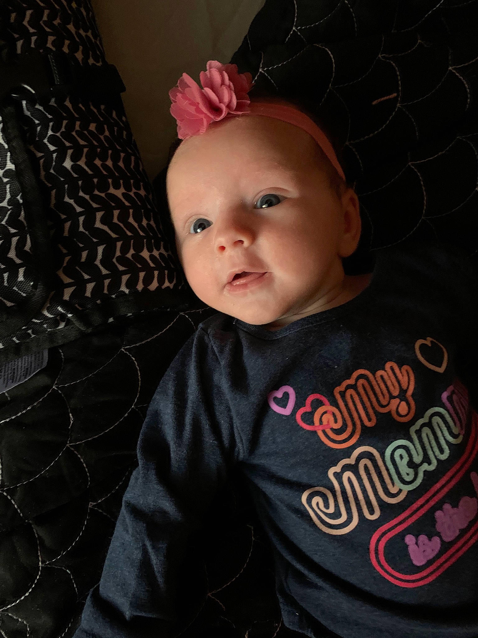 Hensley is registered to the contest to win money with this photo: baby, baby_toddler_clothing, cheek, child, cool, ear, eye, face, forehead, hair_accessory, head, lip, person, photography, pink, skin, smile, textile, toddler