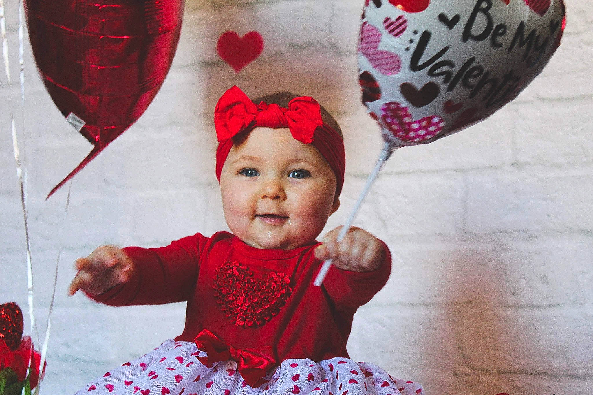 Edith is registered to the contest to win money with this photo: baby_toddler_clothing, child, clothing, costume_hat, dress, fun, happy, headwear, holiday, magenta, organ, pattern, person, photograph, pink, red, sleeve, smile, snapshot, textile