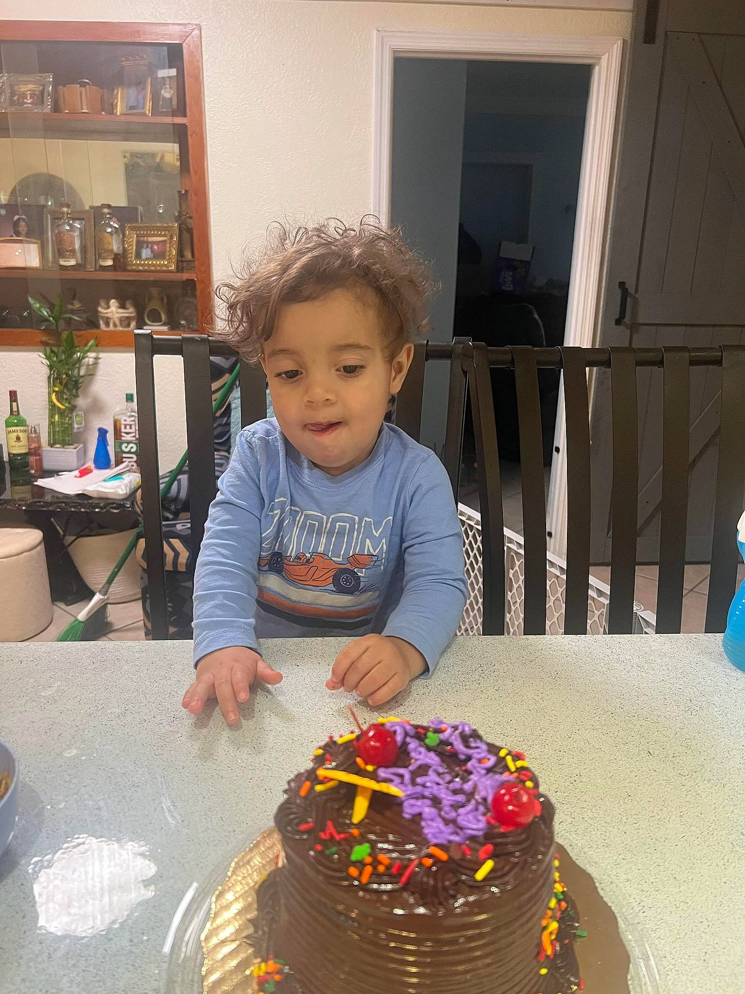 Tobias is registered to the contest to win money with this photo: baked_goods, birthday_cake, birthday_candle, buttercream, cake, cake_decorating, cake_decorating_supply, chair, cuisine, dish, food, furniture, icing, kuchen, person, plate, shelf, sugar_cake, sugar_paste, table