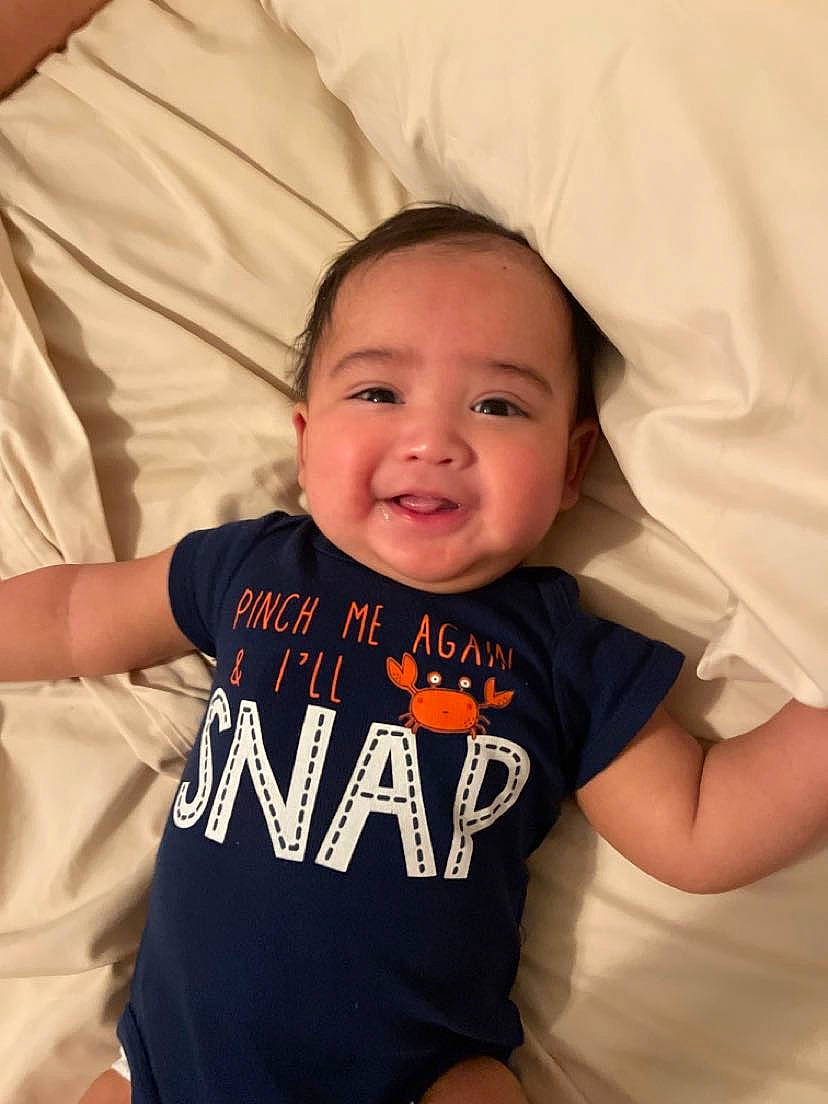 Khaliyah is registered to the contest to win money with this photo: arm, cheek, chin, eye, eyebrow, face, facial_expression, forehead, hairstyle, hand, head, human, lip, mouth, neck, nose, person, product, shoulder, skin