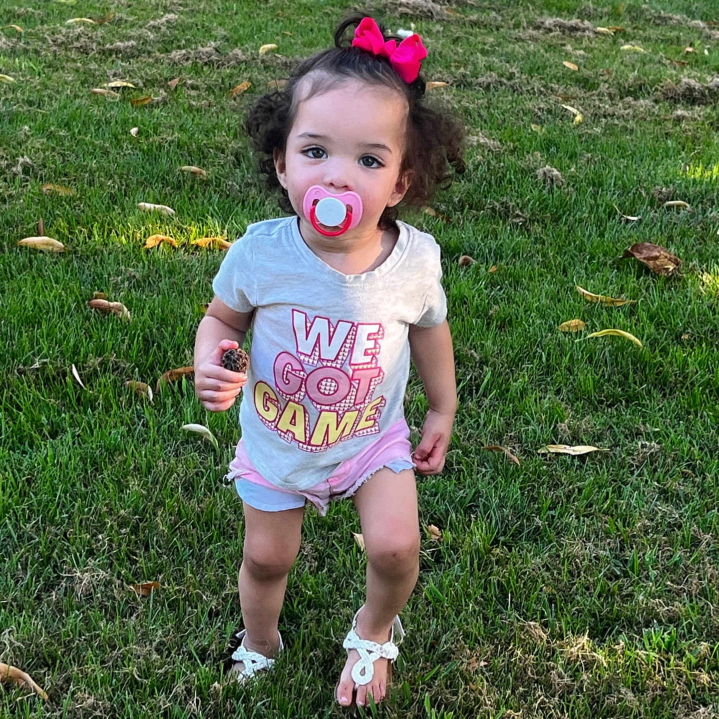 Leilani is registered to the contest to win money with this photo: backyard, child, clothing, face, female, girl, grass, head, lawn, nature, outdoors, park, person, photography, plant, portrait, shorts, summer, t_shirt, yard