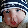 Célestin a rejoint le concours — aidez-le/la à gagner de superbes lots ! baby, closeup, face, blue_eyes, hat, striped, navy, white, scarf, cozy, warm, infant, cute, child, portrait, indoors, soft_texture, clothing, expression, young