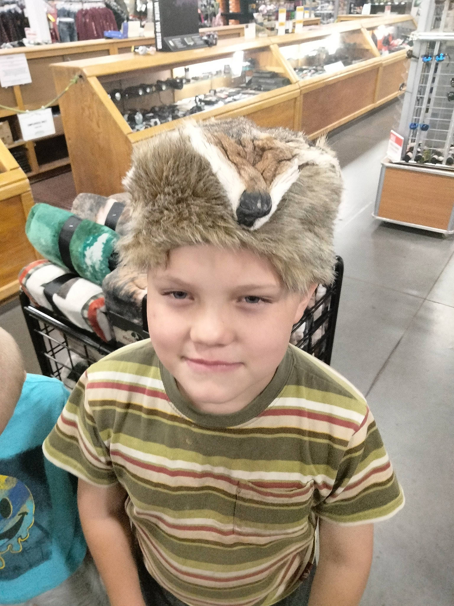 Devon joined the competition — help win amazing prizes! blond, cap, child, eyewear, fashion_accessory, fashion_design, flooring, fun, fur, fur_clothing, hair_coloring, happy, headgear, headpiece, headwear, jaw, joy, person, room, selfie