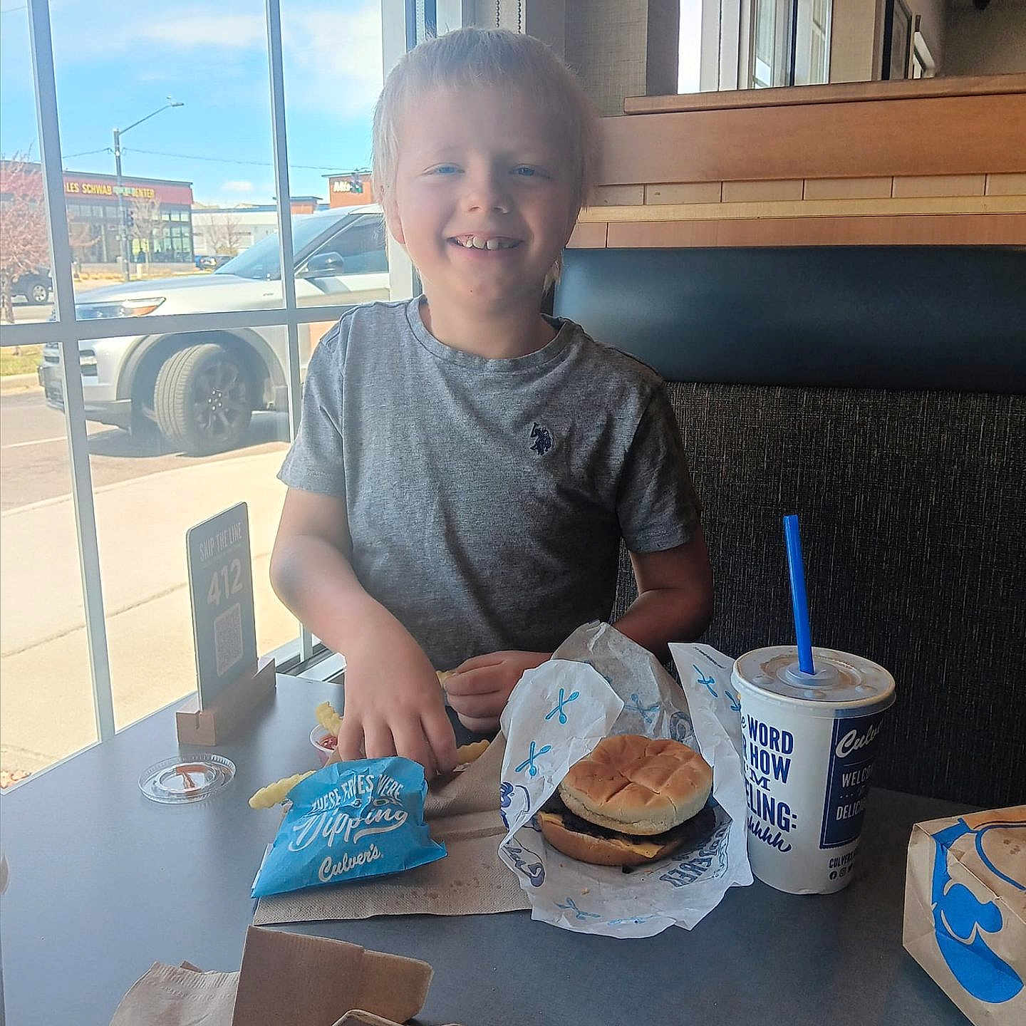 Eli joined the competition — help win amazing prizes! architecture, breakfast, building, burger, clothing, cutlery, diningroom, diningtable, face, food, furniture, head, indoors, lunch, meal, person, photography, portrait, room, table