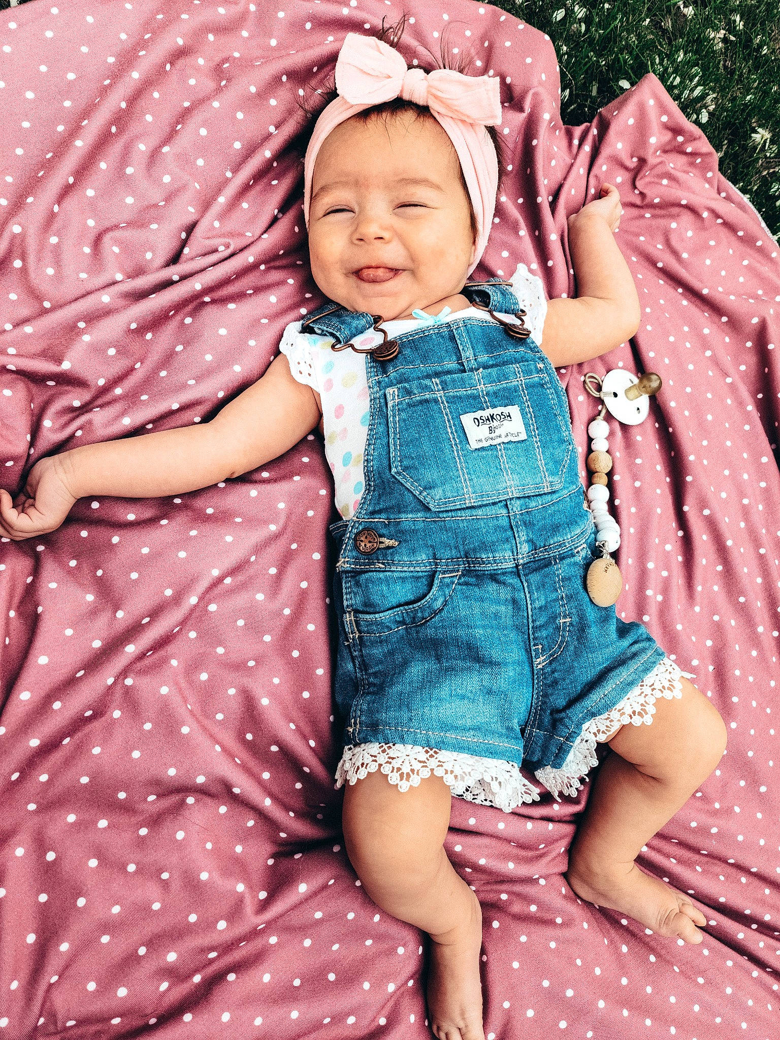 Clara is registered to the contest to win money with this photo: beauty, child, child_model, denim, fun, happy, pattern, person, pink, sitting, skin, smile, textile, toddler