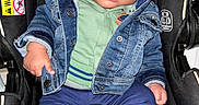 Drayden joined the competition — help win amazing prizes! baby, blue_pants, car_seat, child, clothing, cute, denim_jacket, expression, holding, indoor, infant, jacket, pacifier, person, portrait, seatbelt, sitting, striped_socks, wide_eyes, young