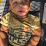 baby, car_seat, casual, child, clothing, cute, expression, eyes, face, hands, indoor, infant, portrait, seatbelt, shadows, skin, sunlight, toddler, yellow_tshirt, young