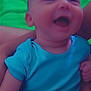 Adan a rejoint le concours — aidez-le/la à gagner de superbes lots ! arm, baby, blue_background, blue_clothing, child, closeup, cute, face, green_background, happy, human, indoor, infant, joyful, laughing, onesie, person, skin, smiling, young